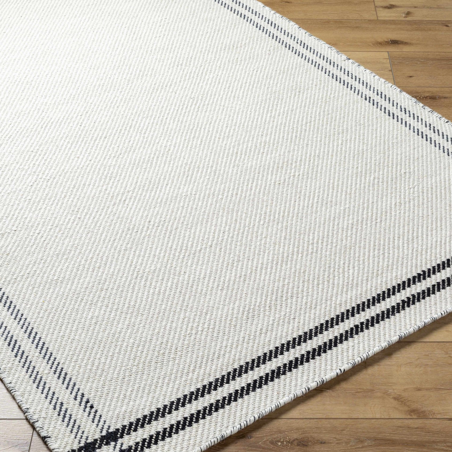Nimue Cream & Blue Bordered Area Rug - Clearance
