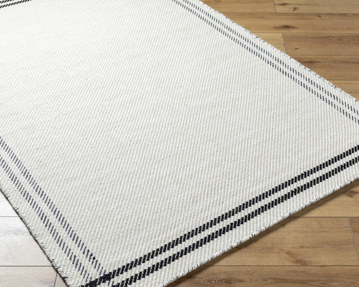 Nimue Cream & Blue Bordered Area Rug - Clearance