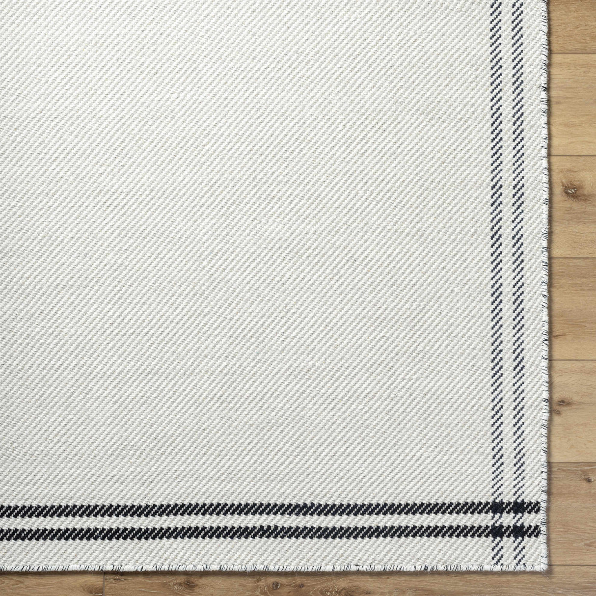 Nimue Cream & Blue Bordered Area Rug - Clearance
