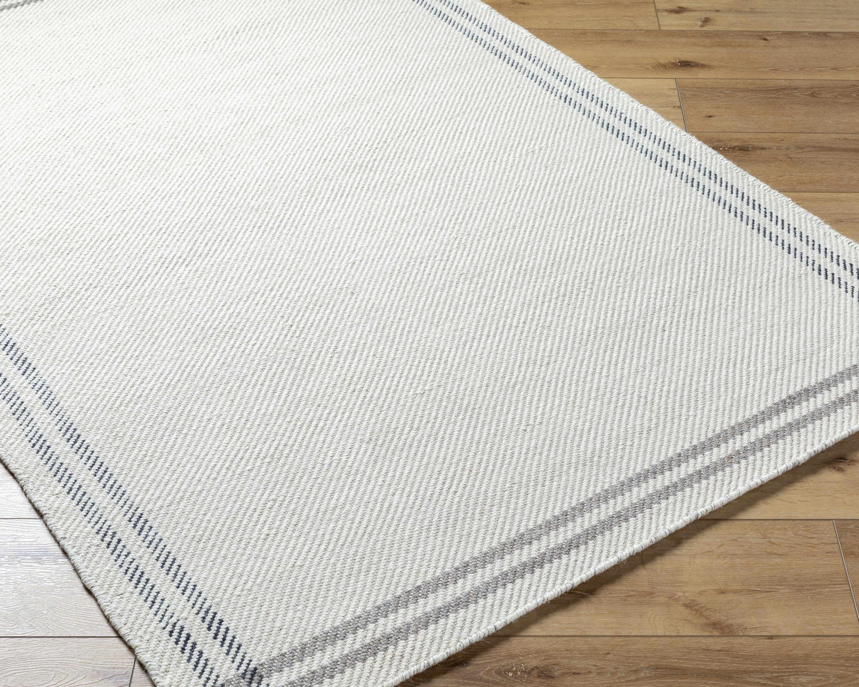 Nimue Cream & Charcoal Bordered Area Rug - Clearance