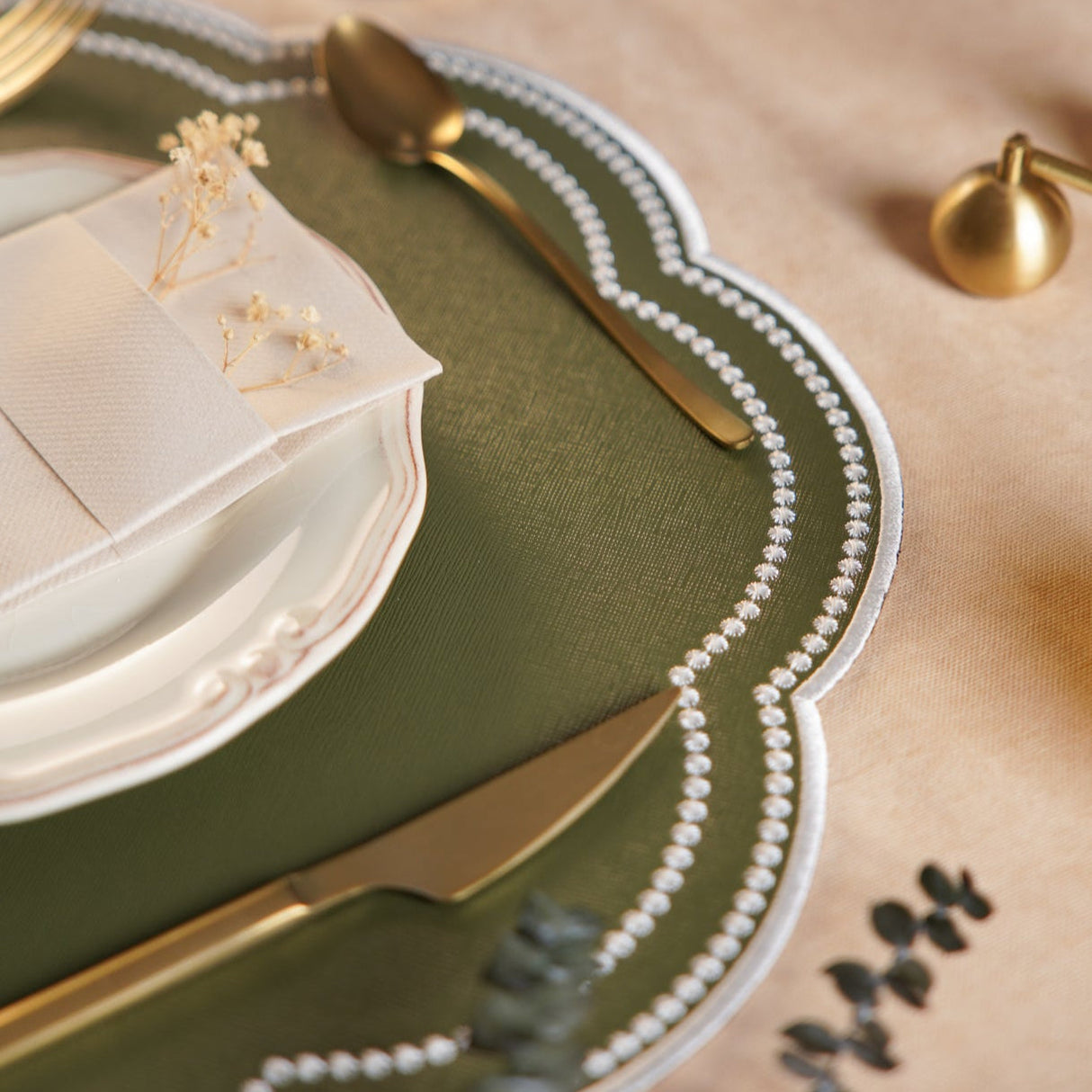 NURTURE GREEN SCALLOPED FAUX LEATHER PLACEMAT