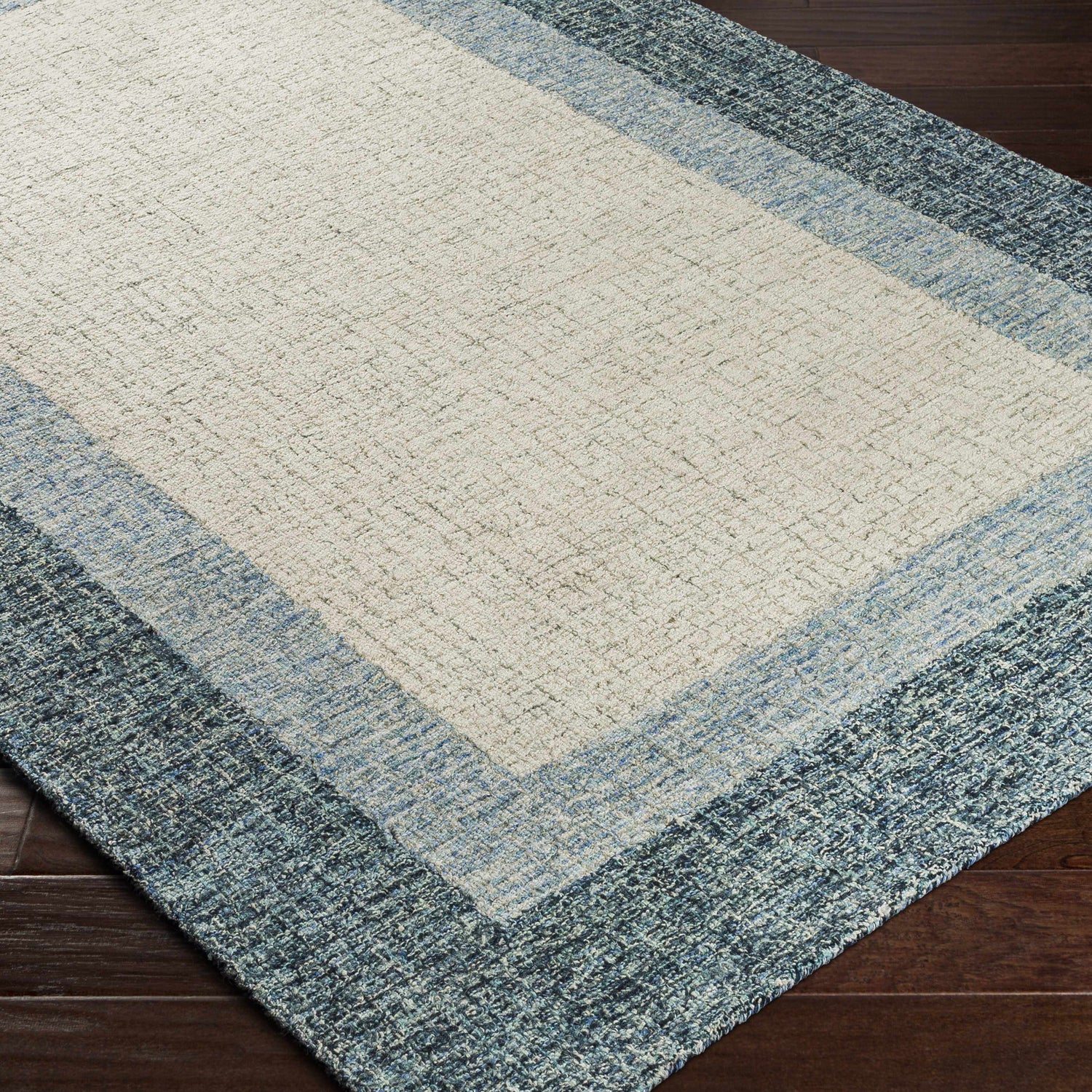 Padada Green Bordered Cream Wool Rug