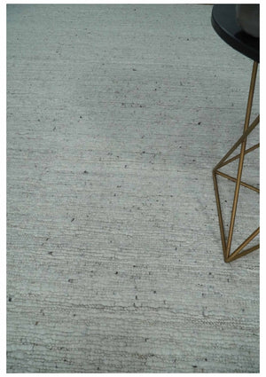 Premium Contemporary loop Pile Ivory Hand woven wool Area Rug