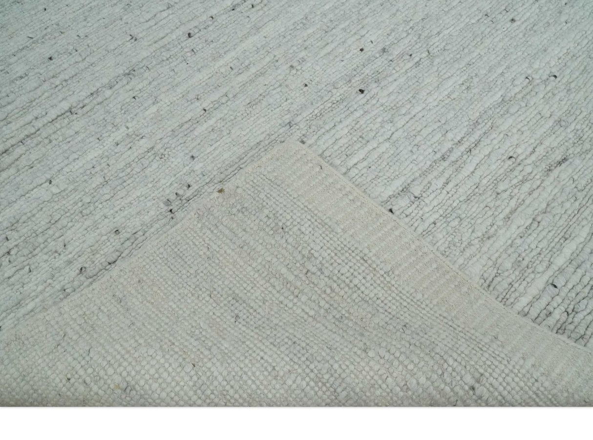 Premium Contemporary loop Pile Ivory Hand woven wool Area Rug