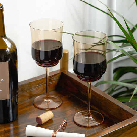 Tulip stemmed wine glass in amber by twine living