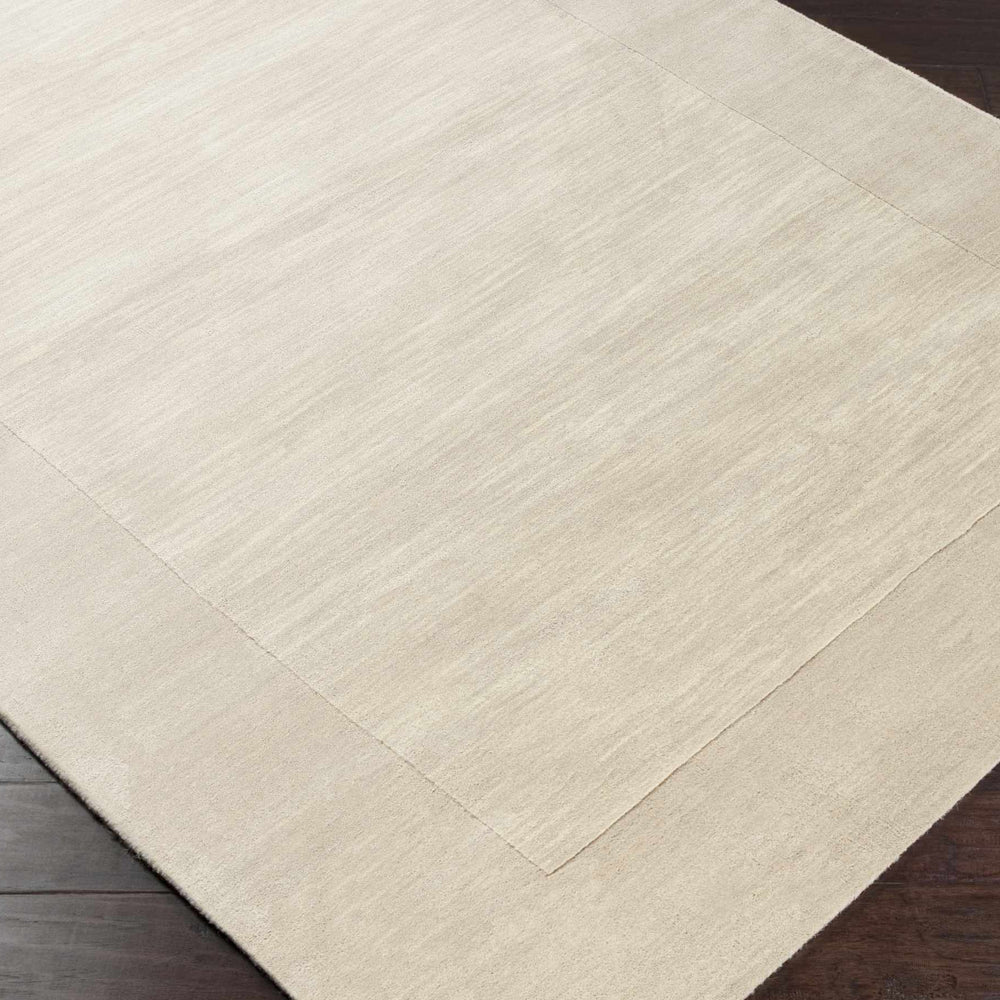 Bordered Solid Beige Cream Wool Rug
