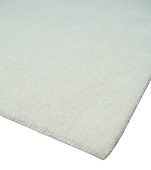 Custom Made Modern Solid Ivory Hand Tufted Wool Rug