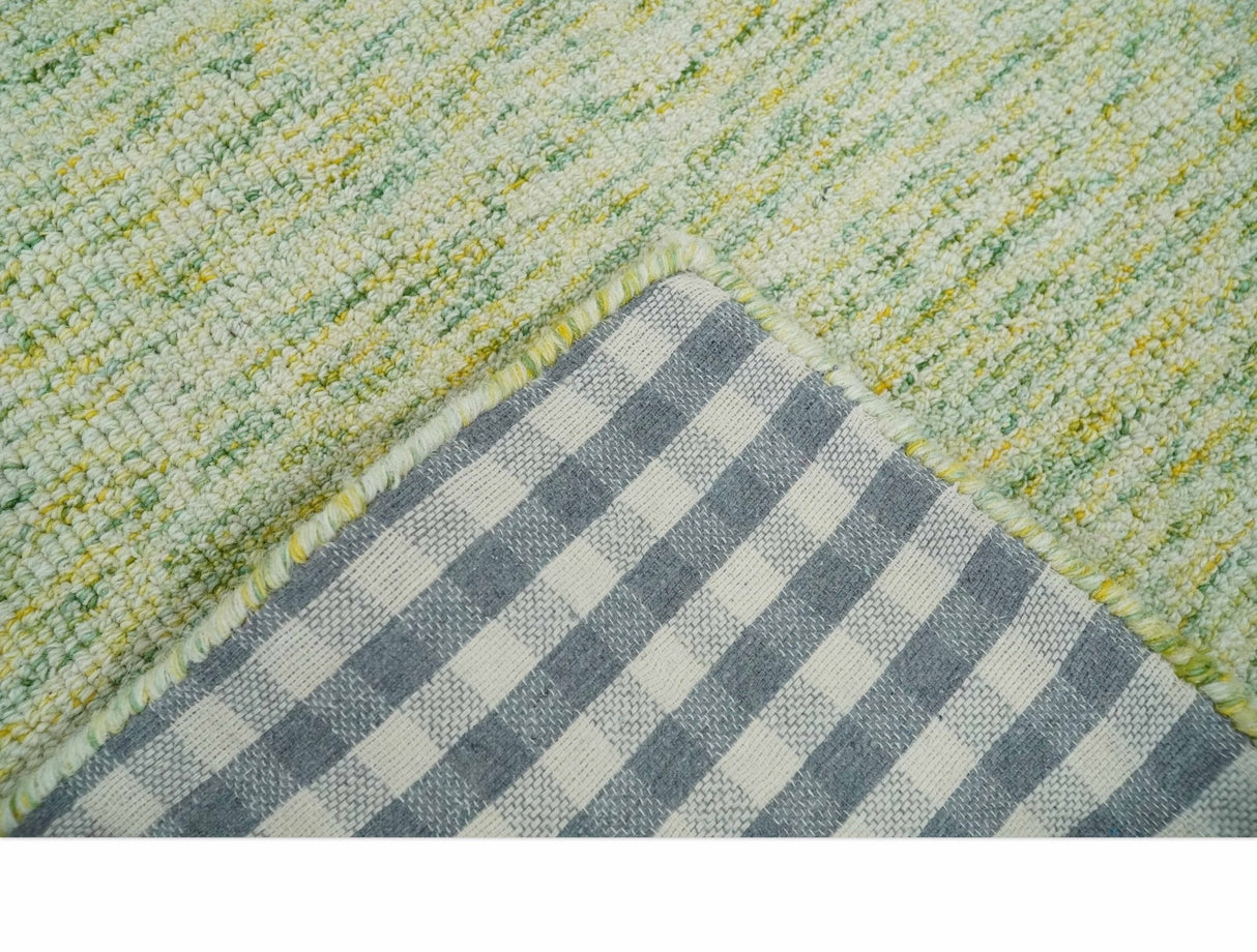 Custom Made Solid Green And Ivory Hand Tufted Natural Wool Area Rug