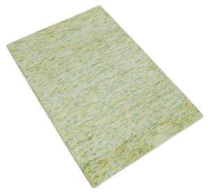 Custom Made Solid Green And Ivory Hand Tufted Natural Wool Area Rug