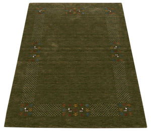 Solid with Border Patterns Hand Loomed Wool Area Rug