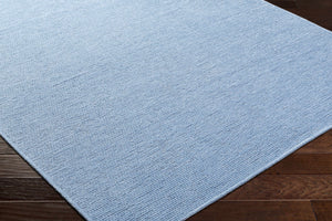 Isako Blue Solid Washable Area Rug - Clearance