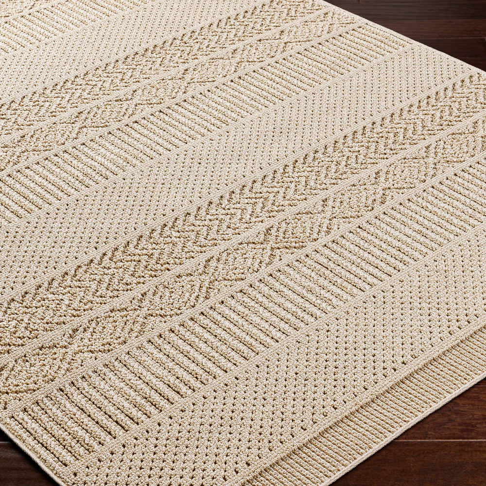 Corom Beige Area Rug - Clearance