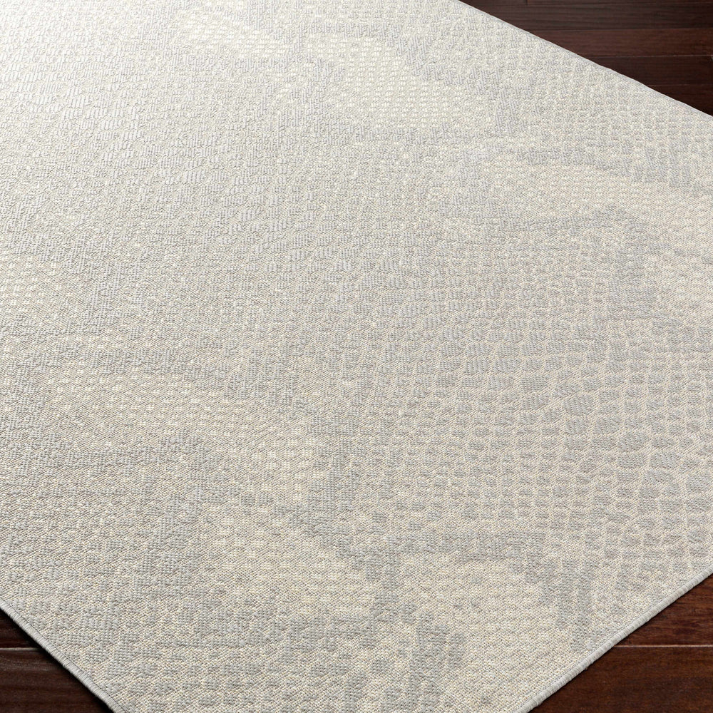 Estee Cream Snake-Patterned Area Rug - Clearance