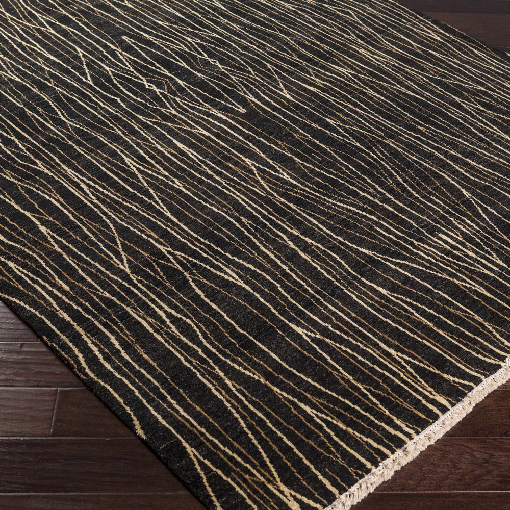 Olavi Black Area Rug - Clearance