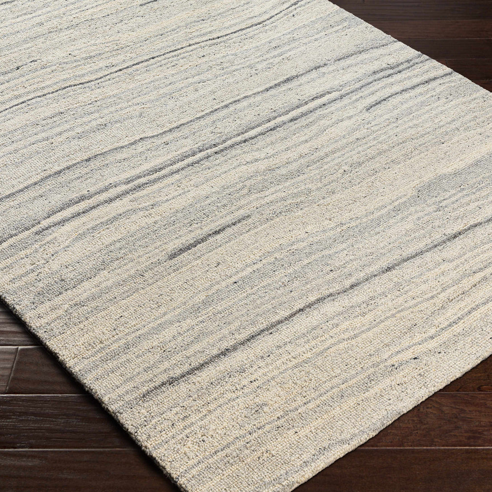 Tinubuan Area Rug - Clearance