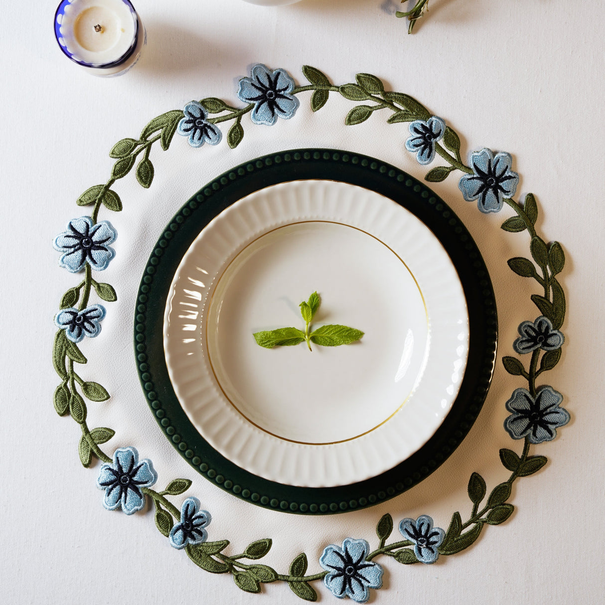 Unity White Blue Round Faux Leather Placemats