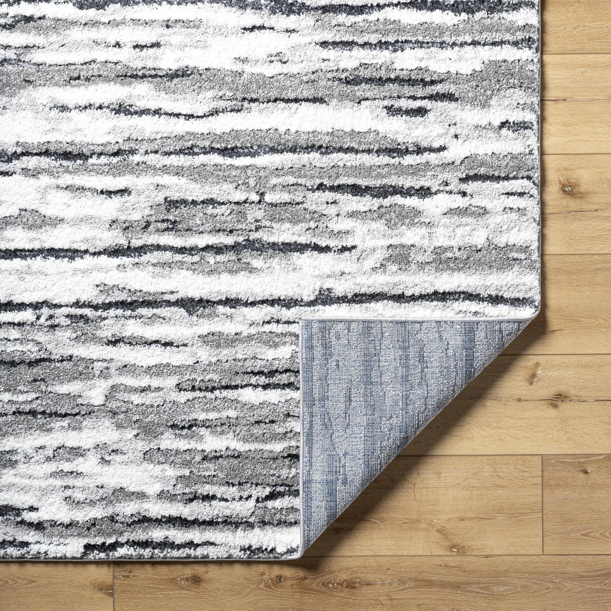 Vembo Area Rug - Clearance