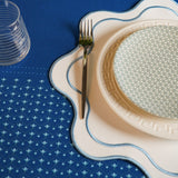 Haven White Wavy Edge Blue Trim Faux Leather Placemats
