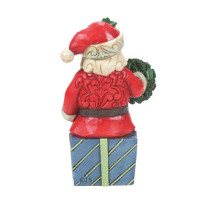 Santa Sitting on Gifts