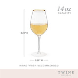 Gilded stemmed wine glass set by twine