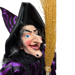 Black and Purple Fabric Sitting Halloween Witch