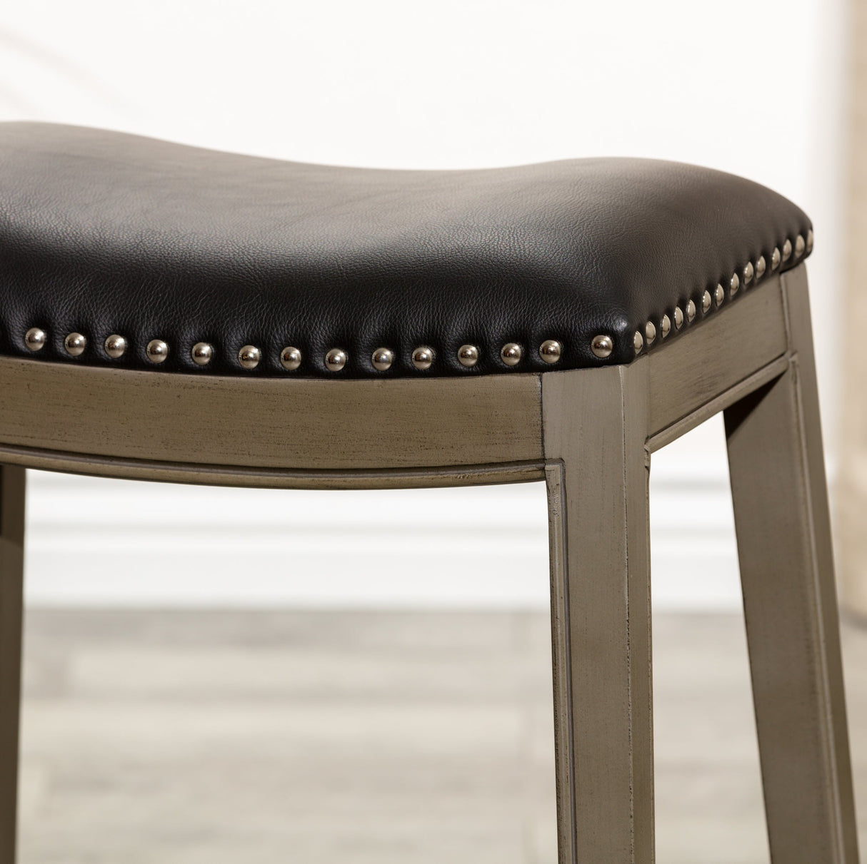 24" Counter Height Saddle Stool, Weathered Gray Finish, Black Leather Seat - Tuesday Morning-Chairs & Seating